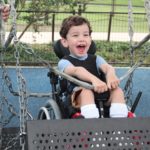 Little Boy on Wheelchair swing